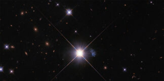 A tiny hidden galaxy provides a peek into the past galaxy